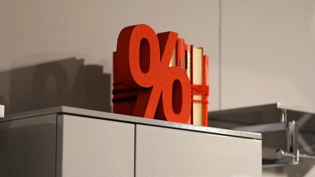 A close-up of a price tag on a book, symbolizing pricing strategy.