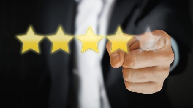 A person reviewing customer feedback on a laptop. — cheap PDF strategy