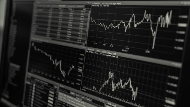 A report showing realistic sales conversion rates on a desk
